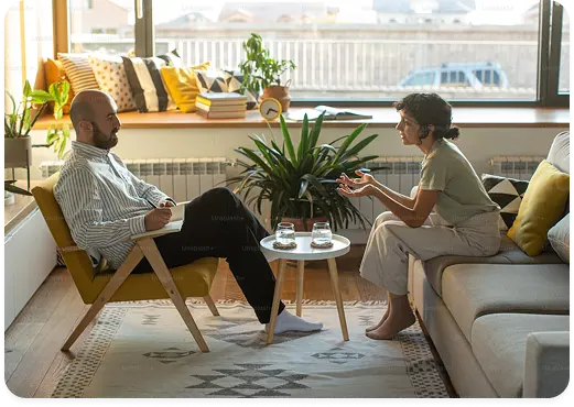Individual receiving guidance from a professional therapist